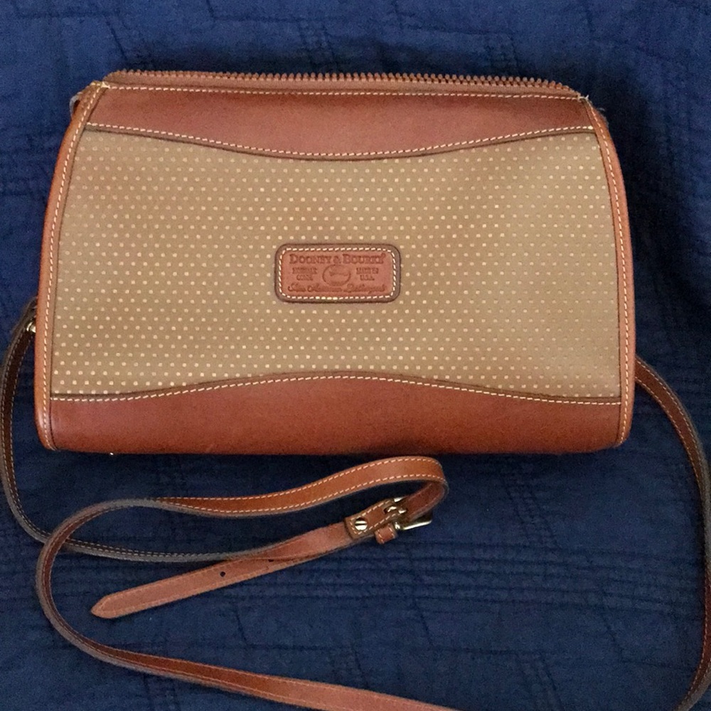 NWOT Dooney and Burke handbag. Pristine condition